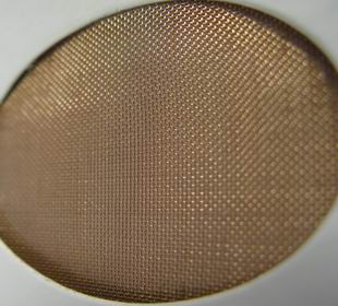 Pharmaceutical sintered mesh laminate filter plate
